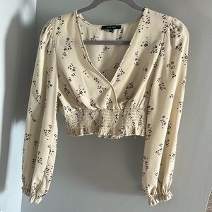 Creme long sleeve blouse with purple flowers